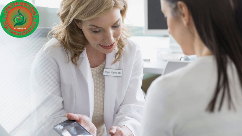 www.rxharun.com/Doctor and patient looking at digital tablet